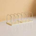 support livres transparent moderne tiroirs poignées lapin blanc grille métal chromé