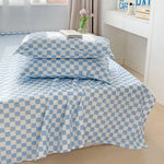 drap lit plat coton bleu clair blanc carreaux géométriques moderne deux oreillers