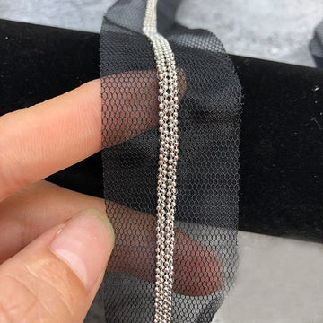 ruban dentelle polyester gris noir maille hexagonale bordure dorée adhésif couture moderne decoration textile