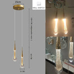 lampe suspendue moderne or noir cristal bulle brillant transparent chambre salon étude