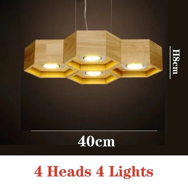 lumière suspendue bois clair nid d'abeille hexagonal modernes led câbles argentés structure géométrique