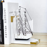 support livres bateau voiles transparentes clips dorés moderne décoratif noir blanc