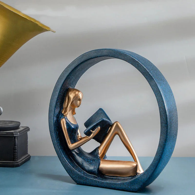 sculpture moderne femme élégante bleu marine doré livre miniature contemporain