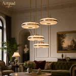 suspension lumineuse moderne marbre doré lumière blanche chaînes métalliques chambre salon restaurant