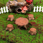 meubles jardin miniature banc fauteuil table tronc arbre champignons clôture rouge marron rustique féerique