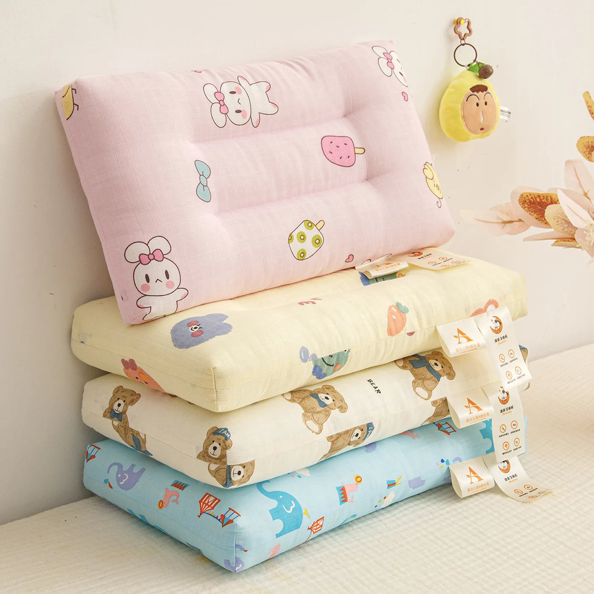 oreiller bébé coton polyester dessin animaux motifs géométriques rose blanc bleuclair protection cou fourragsaisons