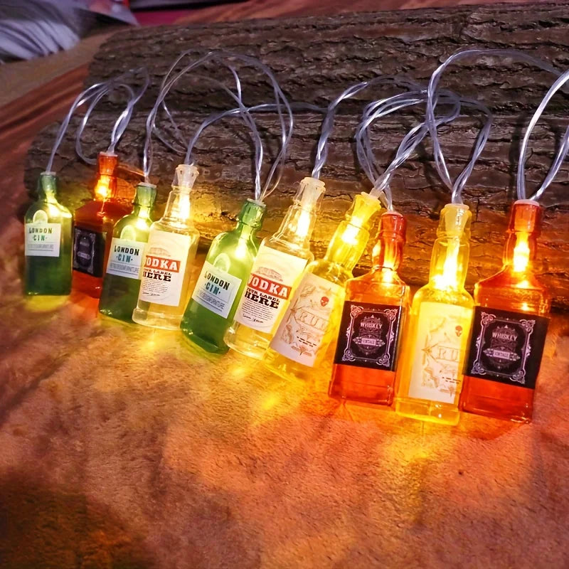 décoration noël guirlande lumineuse bouteilles alcool étiquettes imprimées couleurs chaudes led fil cuivre