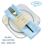 Serviettes de table en coton bleu ciel de 30 x 45 cm, paquet de 12, idéales pour un repas décontracté.