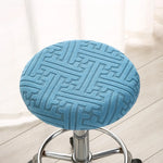 housse tabouret moderne élastique bleu clair gris clair vert clair motif géométrique polyester 30cm
