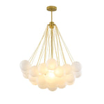 suspension lumineuse moderne boules sphériques blanc chaînes métalliques salon chambre principale étude