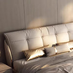 lit moderne minimaliste simili cuir beige clair pieds dorés chambre coucher