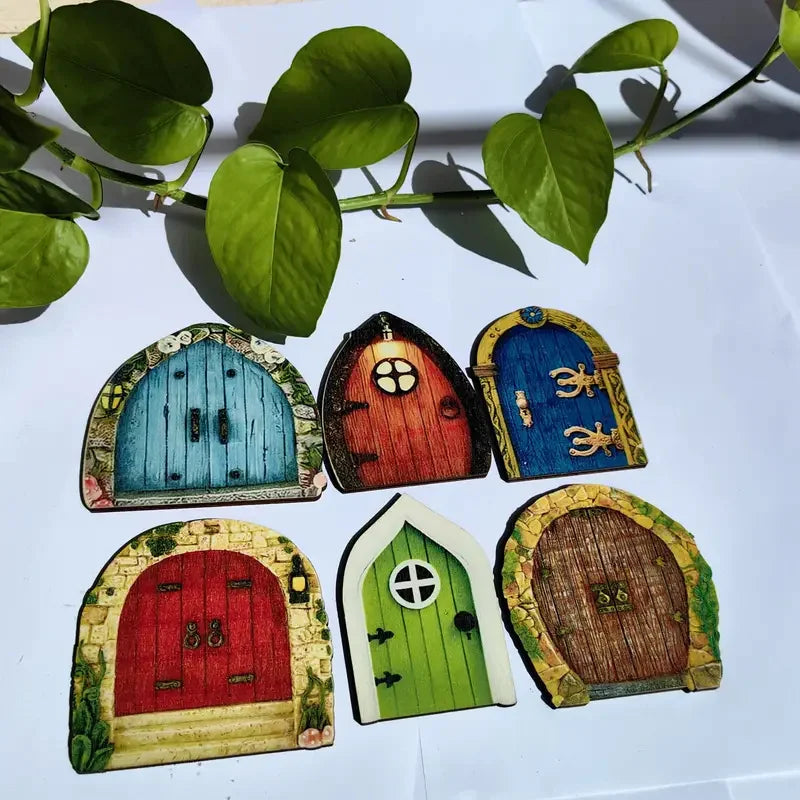 portes décoratives bois fée bleu rouge vert poignées verrou motifs floraux fantaisie enfantine