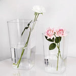 vases modernes transparents rectangulaires lisses intérieur décoration arrangement floral table