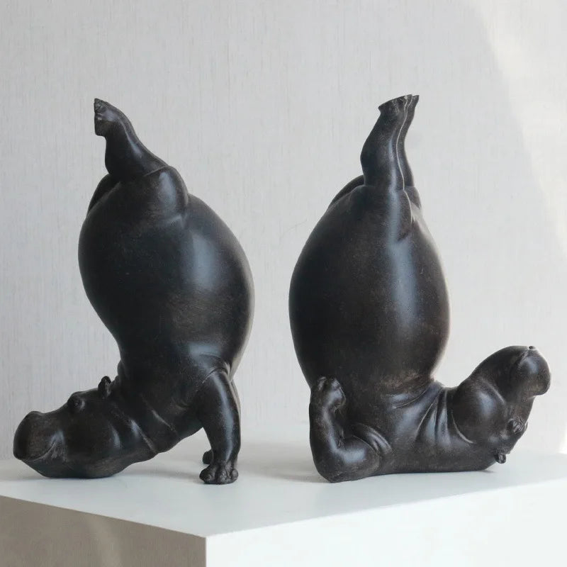 statues hippos noirs résine mat contemporain serre livres
