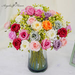 Bouquet fleurs artificielles roses blanches rouges violettes orange classique decoration table mariage événement