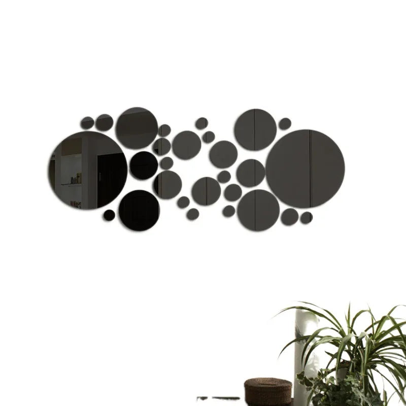 Autocollants muraux miroir acrylique 3D ronds en motif sur un mur blanc