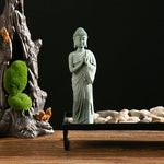 statue jardin bouddha pierre vert clair texture granulée classique