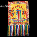 tapisserie décorative tibétaine motifs floraux franges colorées rouge jaune bleu vert blanc