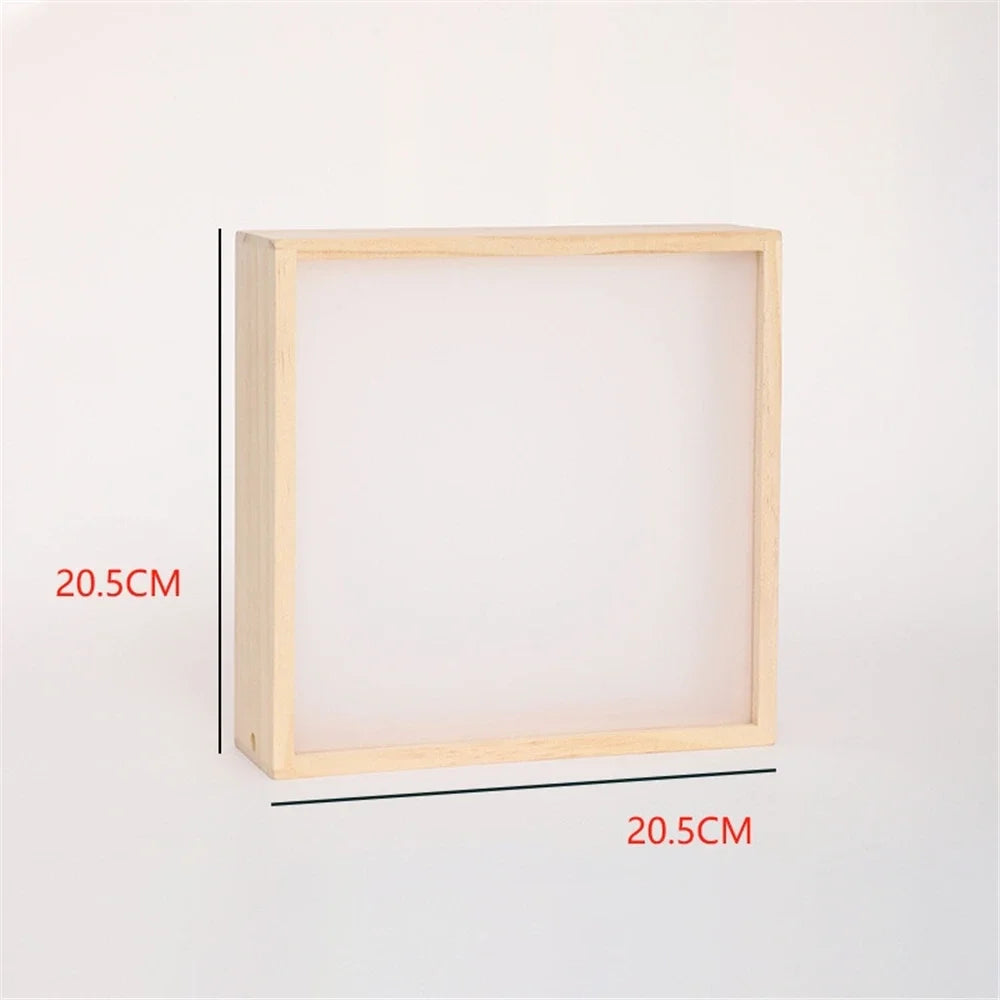 cadre photo bois moderne lumineux décoration mur astronaute blanc opalescent minimaliste
