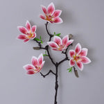 Branche artificielle magnolia fleurs simples feuilles vertes blanc rose jaune verte decoration intérieur