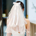 voile mariée tulle plissé blanc classique romantique fixé noeud transparent élégant