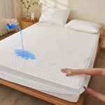 Détail du tissu matelassé de la housse de matelas