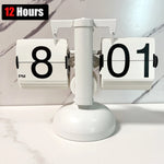 horloge cadran rotatif vintage noir blanc rétro pied circulaire chiffres noirs fond blanc
