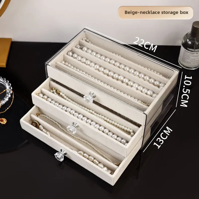 boîte bijoux velours beige clair poignées moderne rangement colliers bagues montres boucles d'oreilles