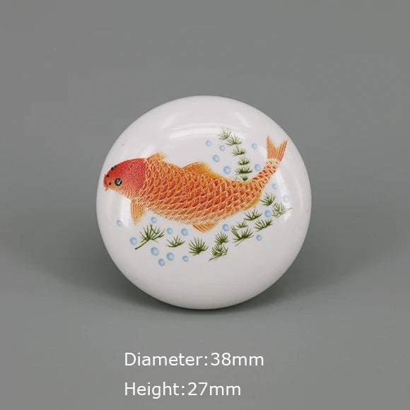 boutons meuble céramique blanc or noir fleurs poissons géométriques classiques