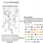 lampes suspendues modernes sphères colorées brillantes intensité variable transparentes opaques chambre salon