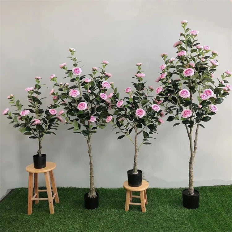 arbre artificiel vert feuilles fleurs roses blancs decoration intérieure moderne pot noir