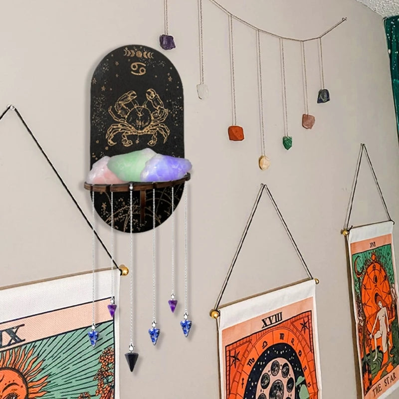 étagère murale noire dorée ornementations astrologiques pendeloques semi précieuses artisanal