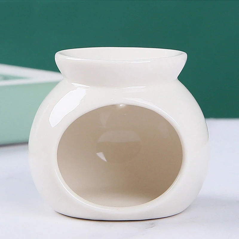 diffuseur d'odeurs brûleur d'arômes bougie céramique moderne vert bleu rouge rose jaune blanc salon