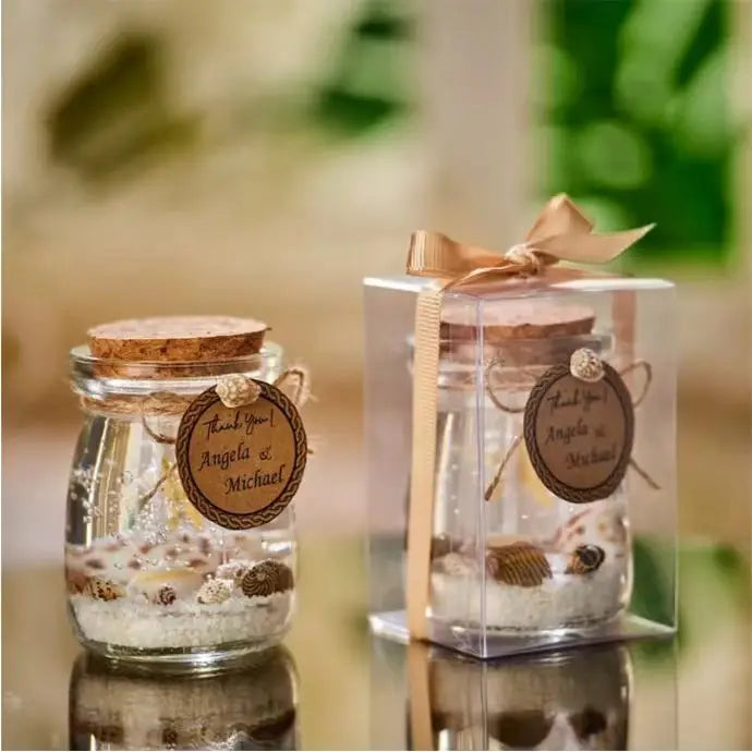 bougie verre étoiles mer coquillages sable transparent rose anniversaire mariage noël festive