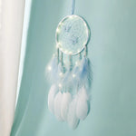 attrape rêves boho chic papillons plumes rose clair blanc moderne chambre décoration suspendue