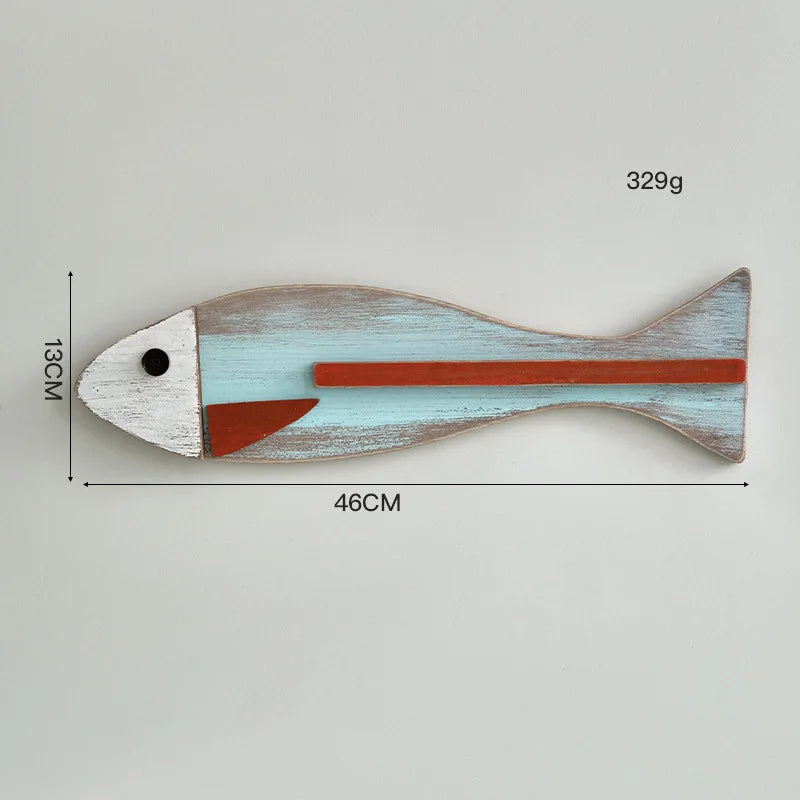 décoration murale poissons bois couleurs vives artisanal thème océan vintage