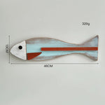 décoration murale poissons bois couleurs vives artisanal thème océan vintage