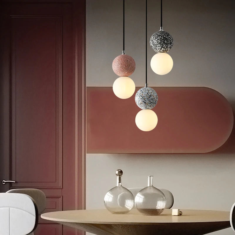suspension lumineuse moderne ampoules led blanc noir rose gris texture granulée câble suspendu minimaliste