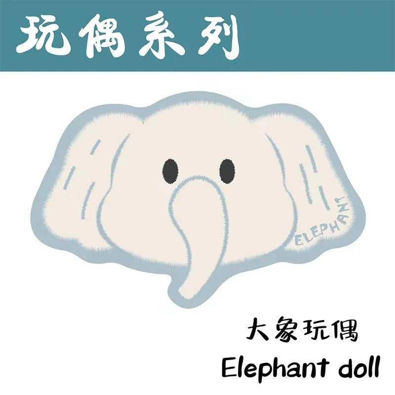 Peluche d'éléphant stylisée avec des éléments graphiques et de texte en chinois.