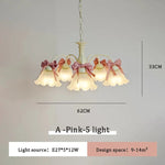 chandelier suspension vert pâle rubans roses abat jour translucides chambre enfant romantique