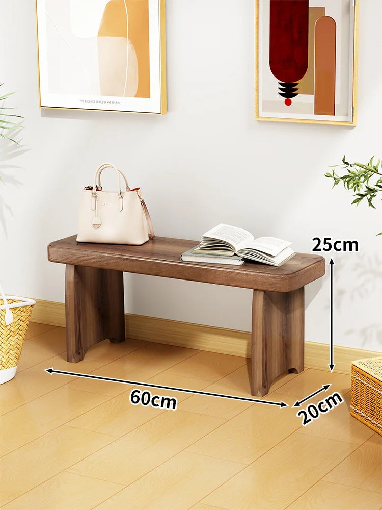 Banc bois marron clair texture naturelle moderne salon tabouret sac main livre ouvert decoration