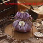 sac cadeau violet satiné ruban doré blanche élégant anniversaire bijoux cadeau opulent 10 pièces