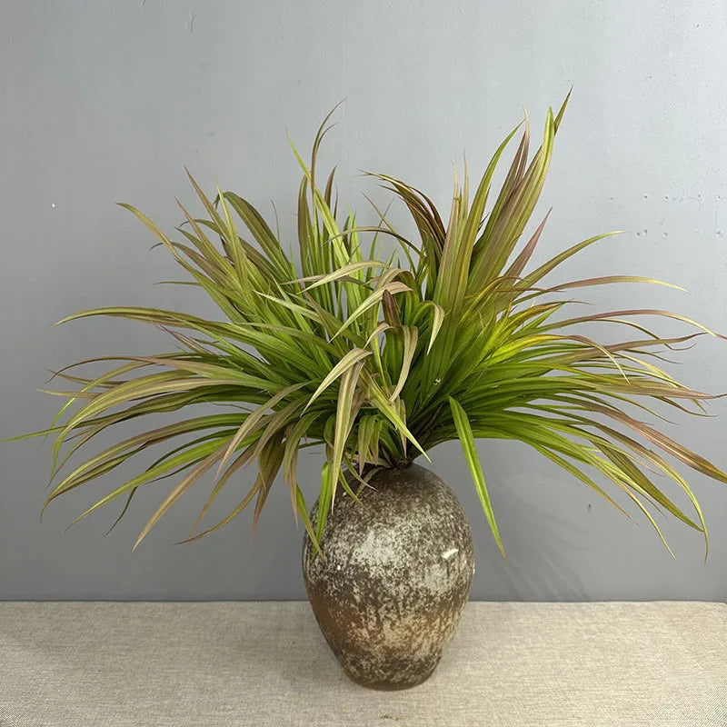 décoration intérieure plante artificielle herbe naturelle vase céramique feuilles vertes longues maison festive