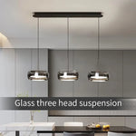 suspension lumineuse moderne minimaliste transparente noir couleurs pendentif verre lisse salon chambre