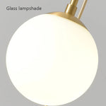 suspension lumineuse ornement sphérique blanc matière transparente moderne fixation câbles inclusion câble électrique