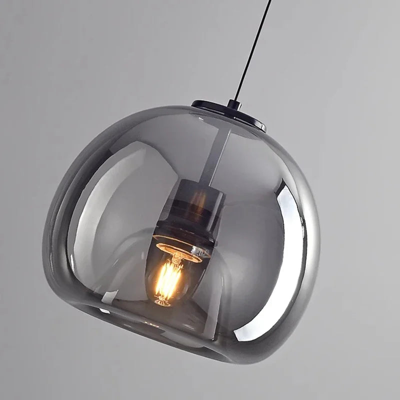 suspension pendentif noir transparent moderne têtes ambrées têtes noires flux lumineux 249 2000 autonome