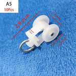 rouleaux rideaux blancs anneaux métalliques modernes quincailleries fixations poulies tringles curseurs roues mat inoxydables