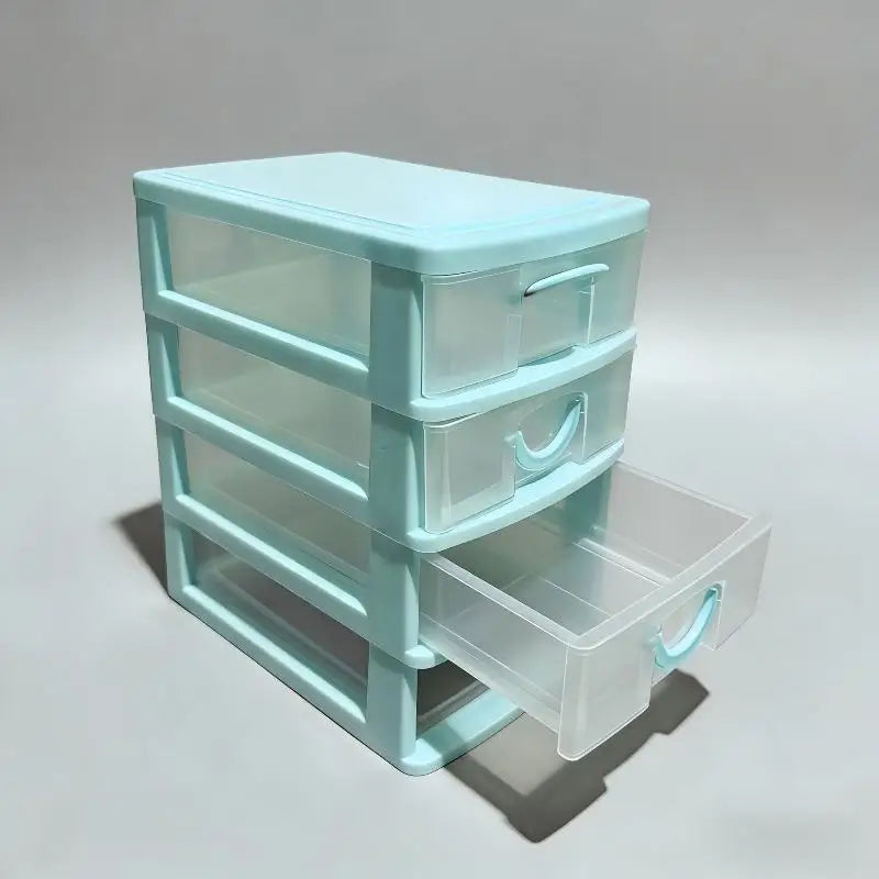 boîte rangement transparente bleu clair moderne niveaux tiroirs poignées bijoux strass domestique