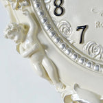 horloge murale baroque motif floral angelique blanc salon decoration aiguille quartz résine unique
