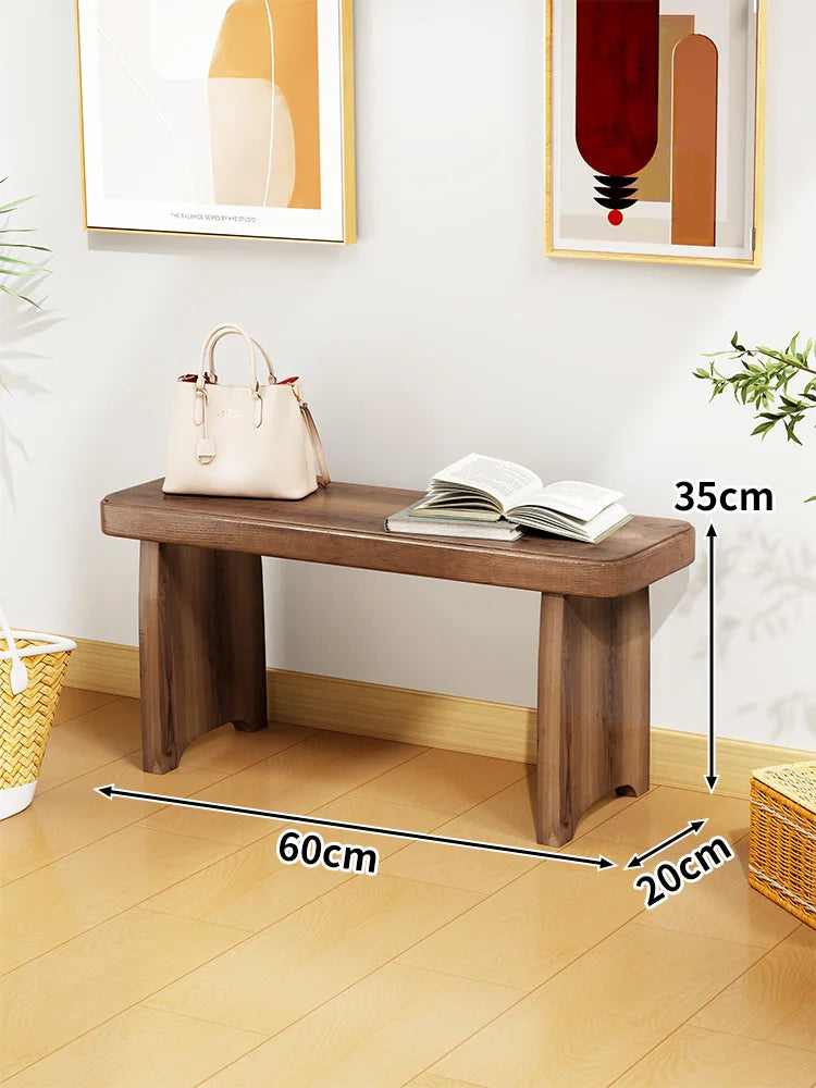 Banc bois marron clair texture naturelle moderne salon tabouret sac main livre ouvert decoration